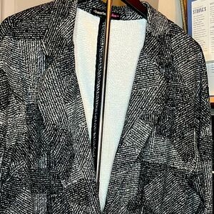 Chic and versatile black-and-white geometric blazer by Hearts Soul Plus.